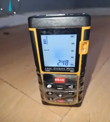 checking-ceiling-height-with-digital-measure-bradford-june-26