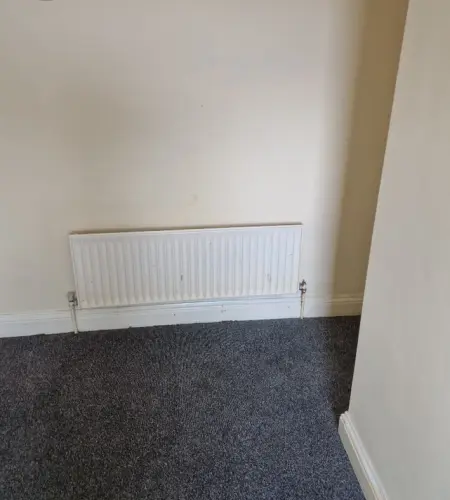 checking-central-heating-radiator-for-trvs-castleford-june-26
